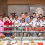 Group photograph inside Maison Kayser in Ouagadougou, Burkina Faso